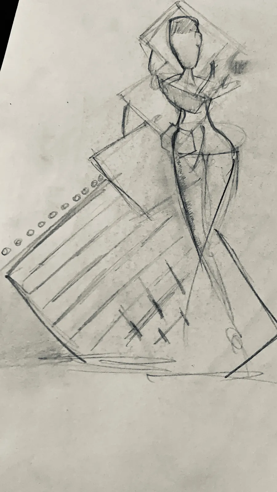 Une figure dessinée au crayon sur une feuille inclinée