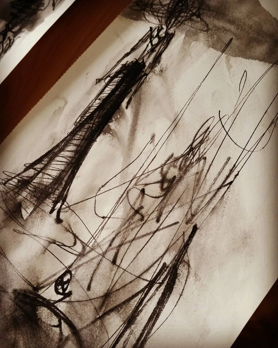 Figures au trait et au lavis sur une feuille inclinée