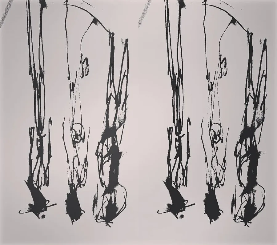 Figures à l’encre répétées, la tête en bas